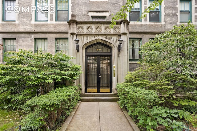35-47 80th St Unit 2, New York City, NY 11372 - doorway to property featuring brick siding