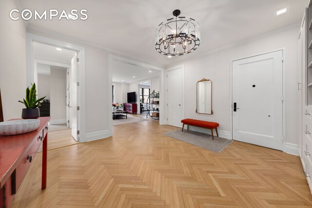 905 W End Ave Unit 81, New York City, NY 10025 - entryway featuring a chandelier, recessed lighting, baseboards, and crown molding