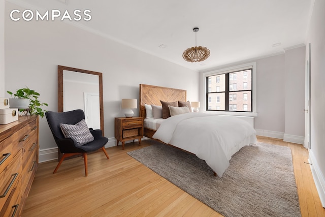905 W End Ave Unit 81, New York City, NY 10025 - bedroom with light wood-style flooring, ornamental molding, and baseboards