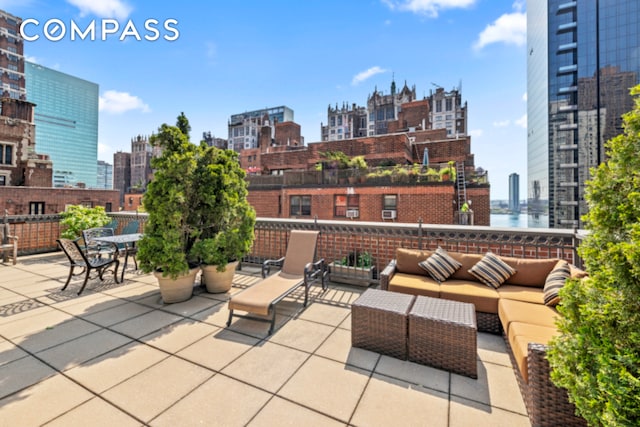 305 E 40th St Unit 14V, New York City, NY 10016 - view of patio with a skyline view and outdoor lounge area