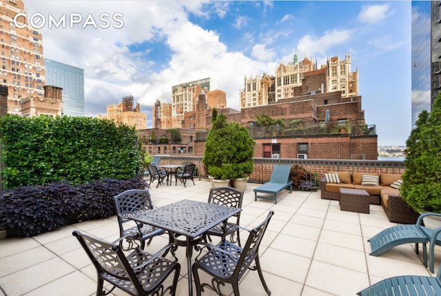 305 E 40th St Unit 14V, New York City, NY 10016 - view of patio with a skyline view and outdoor lounge area