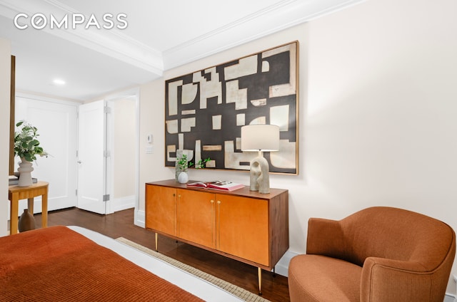 140 E 63rd St Unit 9B, New York City, NY 10065 - bedroom featuring dark wood-style floors, ornamental molding, recessed lighting, and baseboards
