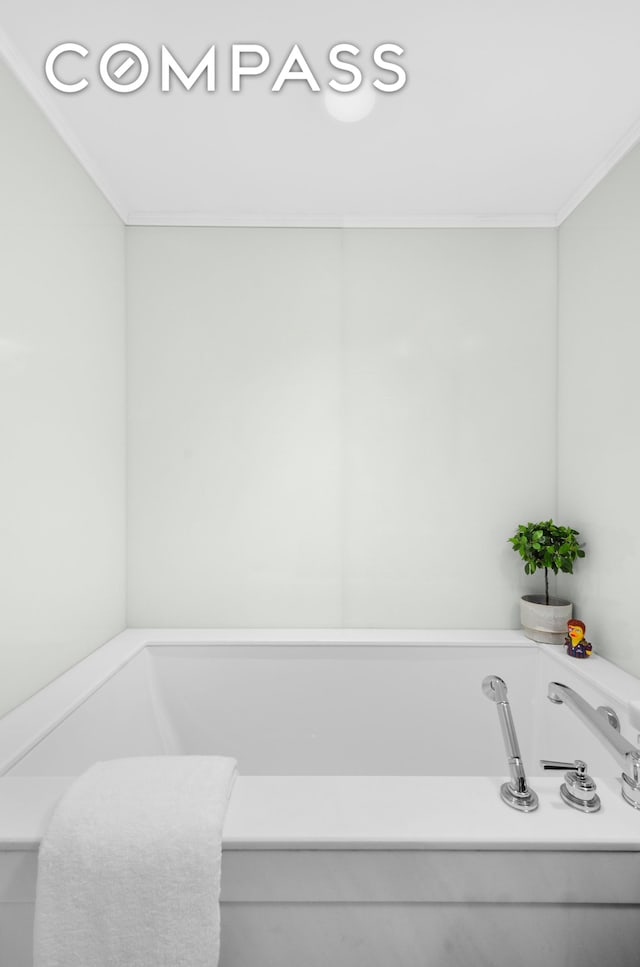 140 E 63rd St Unit 9B, New York City, NY 10065 - full bath with a bath and ornamental molding