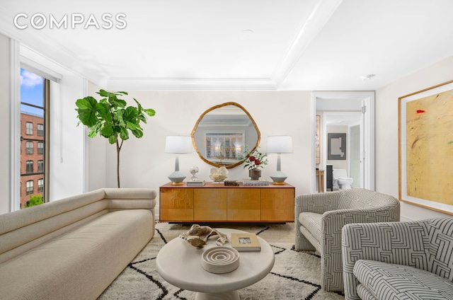 140 E 63rd St Unit 9B, New York City, NY 10065 - carpeted living area featuring crown molding