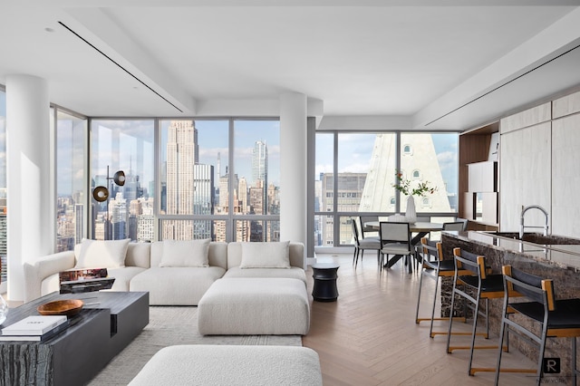23 E 22nd St Unit 55, New York City, NY 10010 - living room with a view of skyline and expansive windows