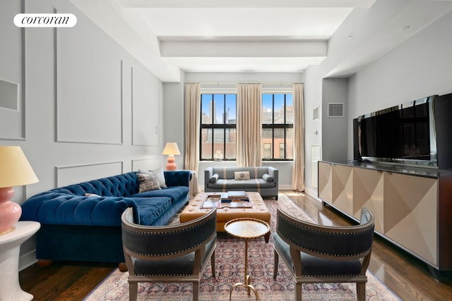 415 Greenwich St Unit 5H, New York City, NY 10013 - living area featuring dark wood finished floors and beamed ceiling