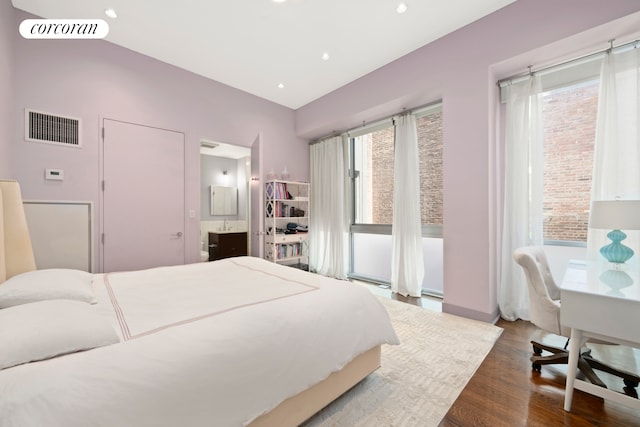 415 Greenwich St Unit 5H, New York City, NY 10013 - bedroom featuring wood finished floors, connected bathroom, and recessed lighting
