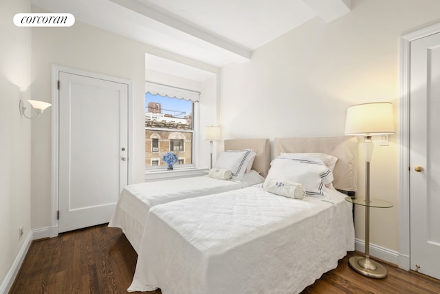 135 E 74th St Unit 11Bc, New York City, NY 10021 - bedroom with dark wood finished floors and baseboards
