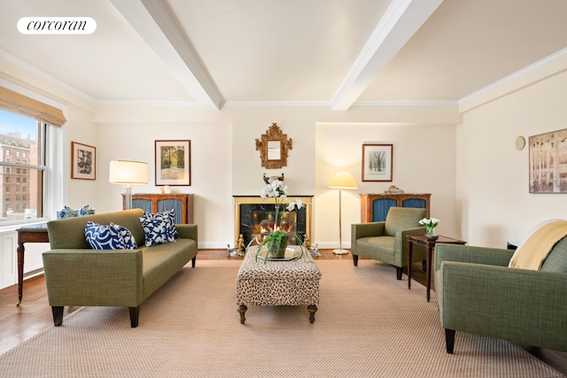 135 E 74th St Unit 11Bc, New York City, NY 10021 - living area with beamed ceiling, crown molding, wood finished floors, and a warm lit fireplace