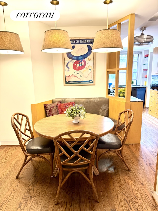 135 E 74th St Unit 11Bc, New York City, NY 10021 - dining room featuring breakfast area and wood finished floors