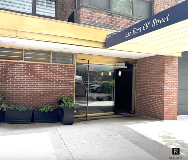 233 E 69th St Unit 3-O, New York City, NY 10021 - entrance to property with brick siding