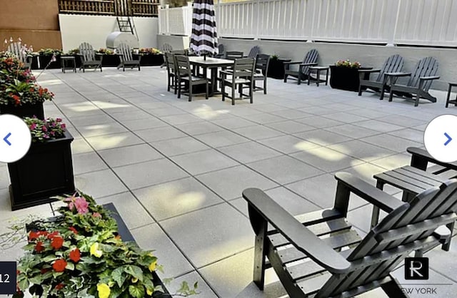 233 E 69th St Unit 3-O, New York City, NY 10021 - view of patio with outdoor dining area