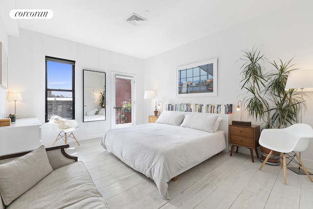 138 Broadway Unit 5G, New York City, NY 11211 - bedroom with light wood-type flooring