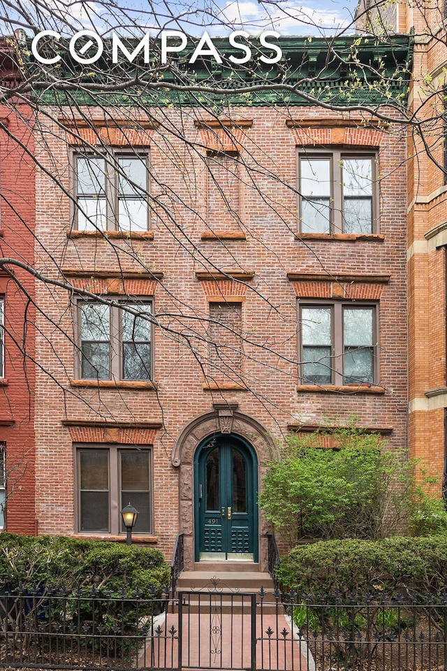 491 12th St Unit 2, New York City, NY 11215 - view of front of property with brick siding and a fenced front yard