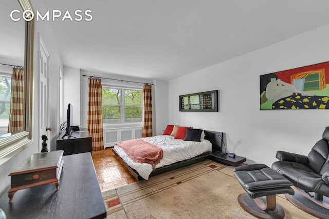 750 Kappock St Unit 307, New York City, NY 10463 - bedroom featuring multiple windows and wood finished floors