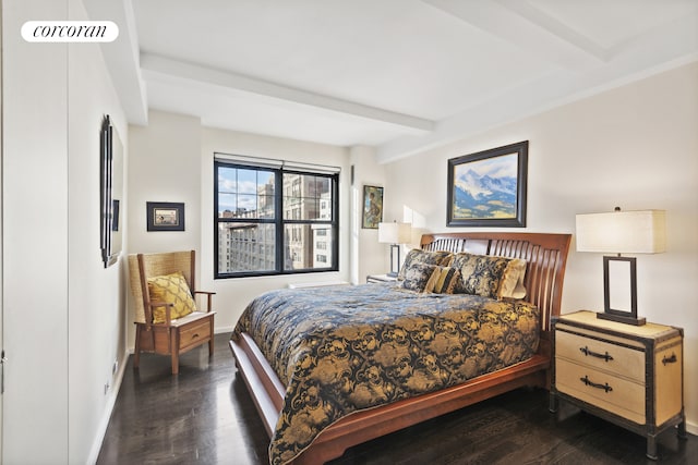 200 E 16th St Unit 14H, New York City, NY 10003 - bedroom with beam ceiling, dark wood-type flooring, and baseboards