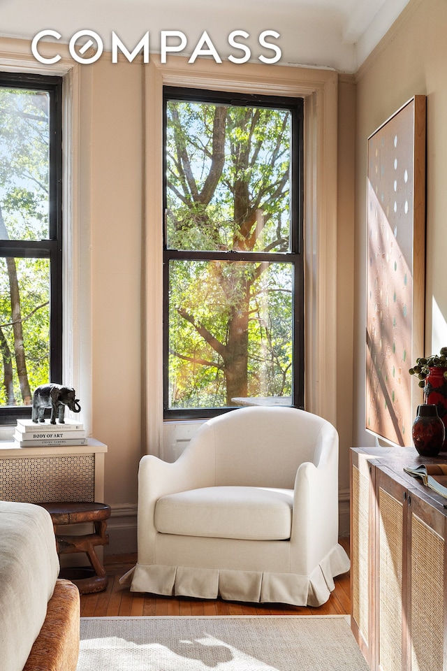 270 Riverside Dr Unit 2C, New York City, NY 10025 - sitting room with healthy amount of natural light and wood finished floors