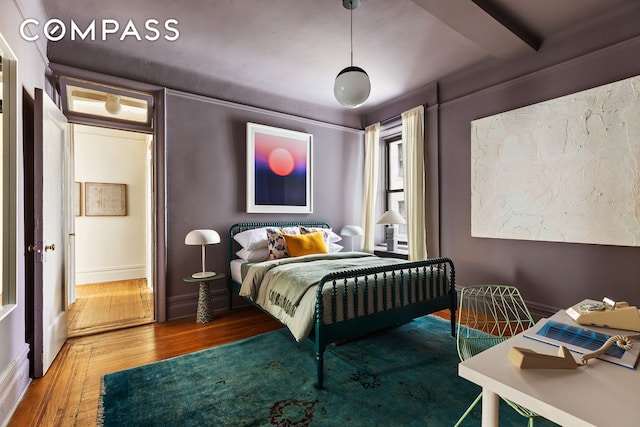 270 Riverside Dr Unit 2C, New York City, NY 10025 - bedroom featuring wood finished floors, baseboards, and beam ceiling