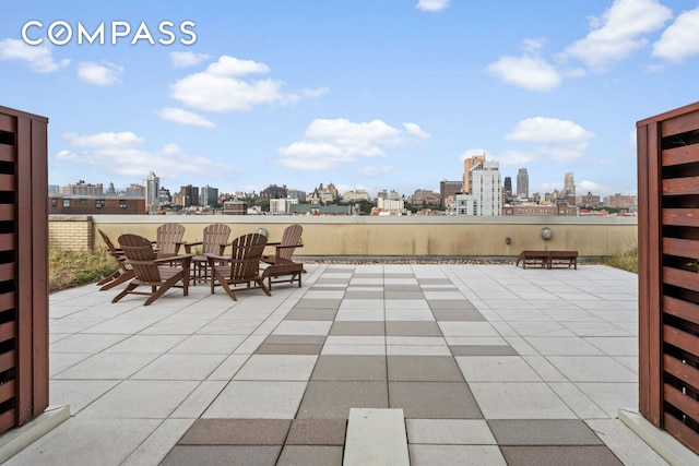 40 W 116th St Unit B302, New York City, NY 10026 - view of patio featuring a skyline view