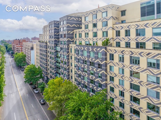 40 W 116th St Unit B302, New York City, NY 10026 - view of apartment building / complex with a city view