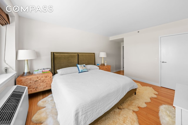 40 W 116th St Unit B302, New York City, NY 10026 - bedroom with wood finished floors and baseboards