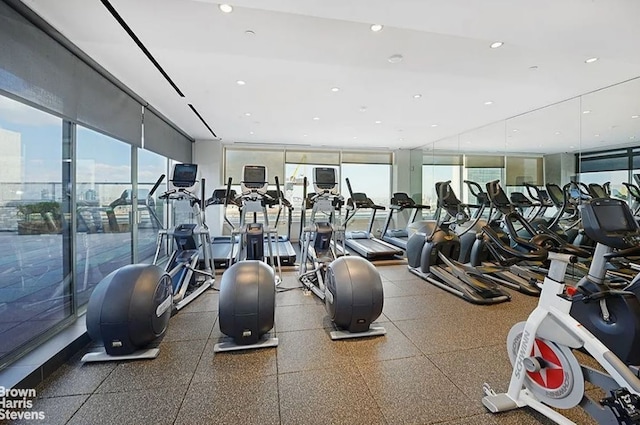 300 E 40th St Unit 20S, New York City, NY 10016 - gym featuring plenty of natural light, recessed lighting, and a wall of windows