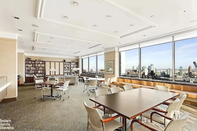 300 E 40th St Unit 20S, New York City, NY 10016 - dining space featuring a city view and a wall of windows