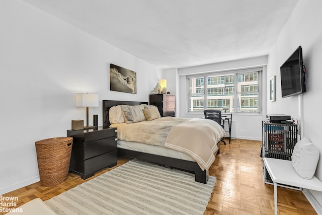 300 E 40th St Unit 20S, New York City, NY 10016 - bedroom featuring baseboards