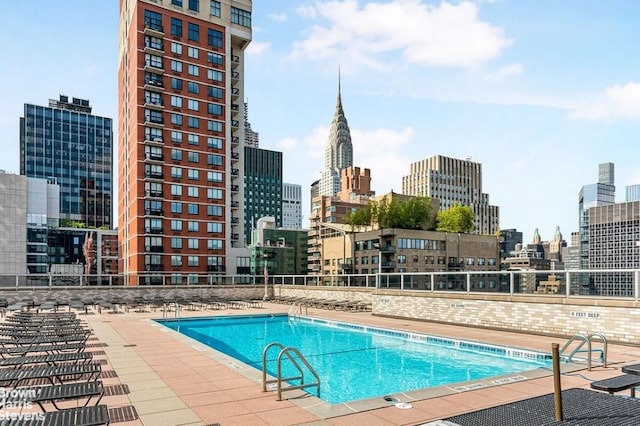 300 E 40th St Unit 20S, New York City, NY 10016 - community pool with a view of skyline