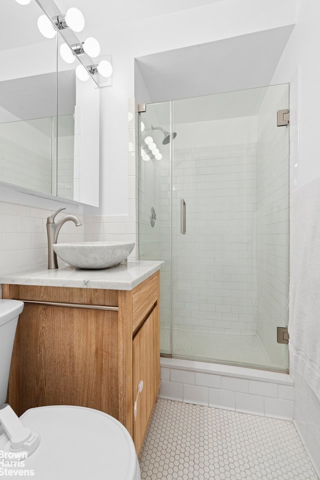 7 E 14th St Unit 905, New York City, NY 10003 - full bath with vanity, a stall shower, and tile patterned floors