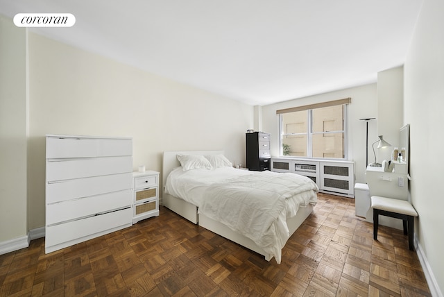 201 E 37th St Unit 4G, New York City, NY 10016 - bedroom featuring baseboards