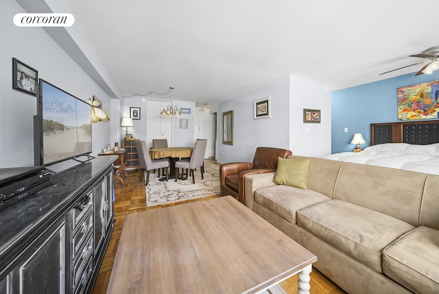 201 E 37th St Unit 4Fg, New York City, NY 10016 - living room featuring a chandelier and a ceiling fan