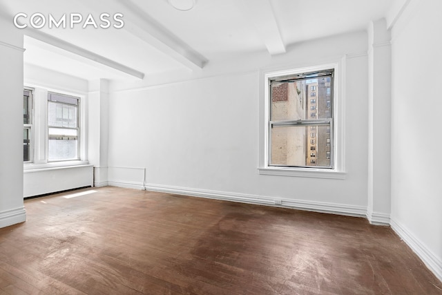 250 W 94th St Unit 8J, New York City, NY 10025 - empty room featuring beamed ceiling and wood finished floors
