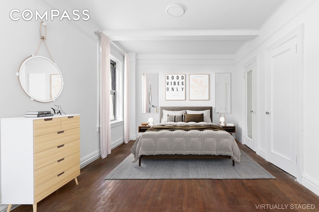250 W 94th St Unit 8J, New York City, NY 10025 - bedroom with dark wood-style floors and baseboards