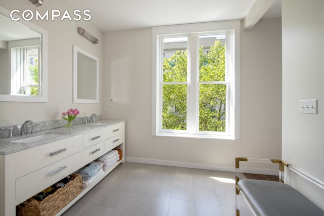 430 W 147th St, New York City, NY 10031 - full bath featuring double vanity and baseboards
