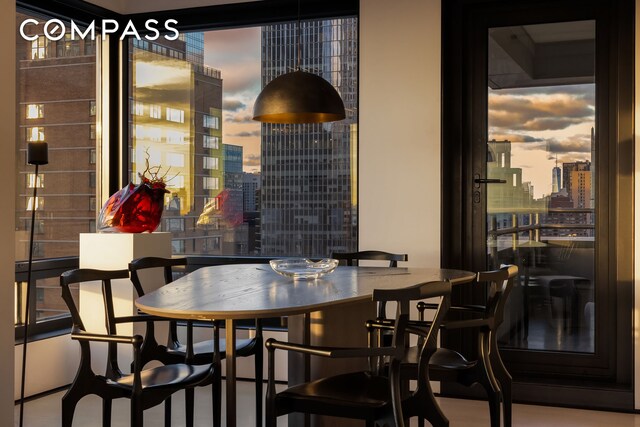 301 W 57th St Unit 36C, New York City, NY 10019 - dining space featuring a city view