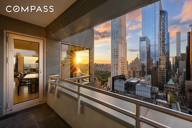 301 W 57th St Unit 36C, New York City, NY 10019 - balcony at dusk with a skyline view