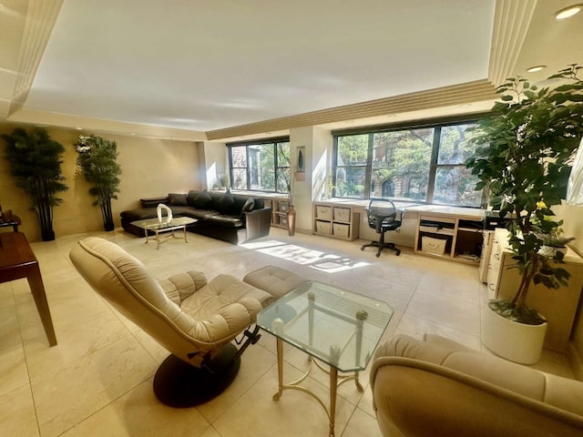 35 E 38th St Unit 3C, New York City, NY 10016 - living room featuring ornamental molding, a desk, a raised ceiling, and light tile patterned flooring