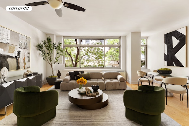99 Jane St Unit 2J, New York City, NY 10014 - living room featuring ceiling fan and wood finished floors