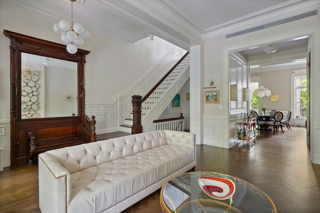 146 St Johns Place, New York City, NY 11217 - living room with a decorative wall, stairway, crown molding, wainscoting, and a chandelier