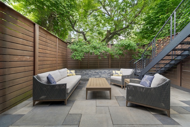 146 St Johns Place, New York City, NY 11217 - fenced backyard with an outdoor living space, a patio area, and stairs