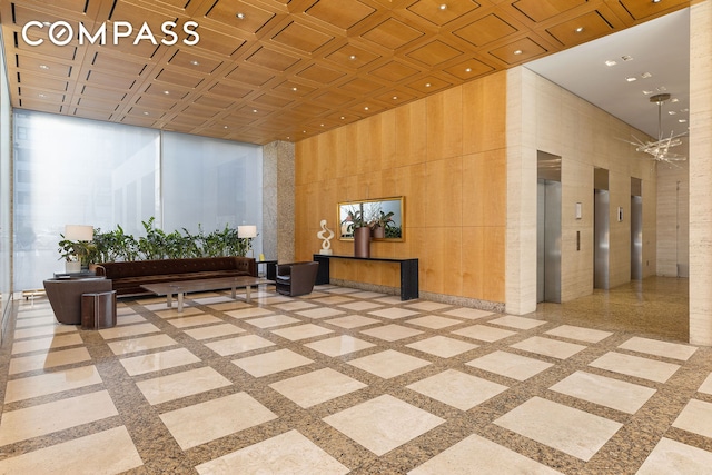 322 W 57th St Unit 33U, New York City, NY 10019 - lobby with a high ceiling and recessed lighting