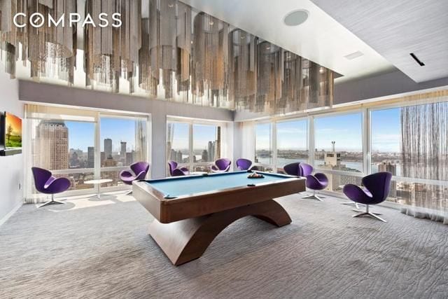322 W 57th St Unit 33U, New York City, NY 10019 - recreation room featuring carpet flooring and billiards