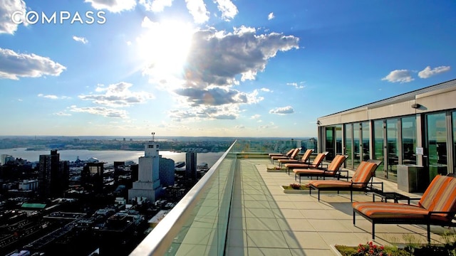 322 W 57th St Unit 33U, New York City, NY 10019 - view of patio / terrace with a water view and a city view