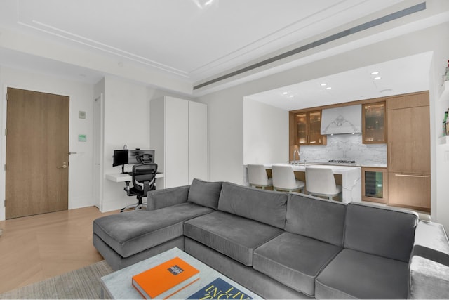 40 Bleecker St Unit 3H, New York City, NY 10012 - living room featuring recessed lighting, a tray ceiling, beverage cooler, wet bar, and baseboards