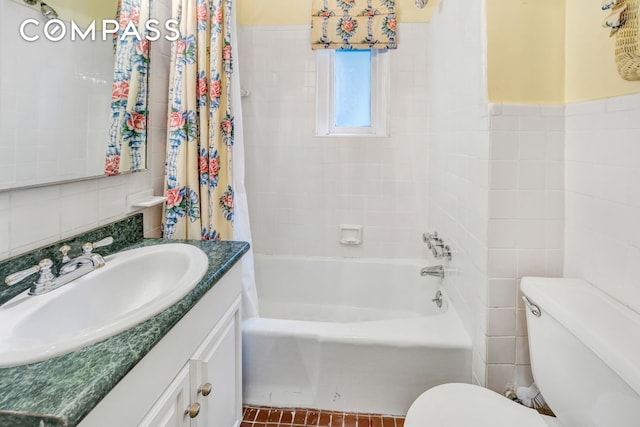 1060 Park Ave Unit 3Ab, New York City, NY 10128 - bathroom featuring toilet, vanity, shower / tub combo, and tile walls