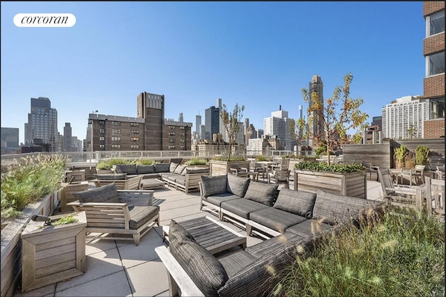 360 E 72nd St Unit C2003, New York City, NY 10021 - view of patio / terrace featuring outdoor lounge area and a skyline view