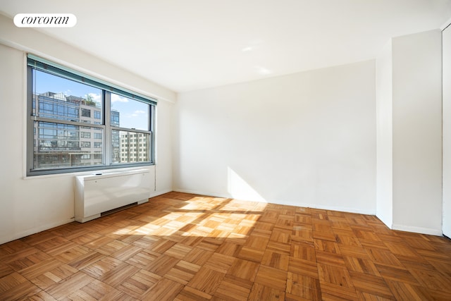 360 E 72nd St Unit C2003, New York City, NY 10021 - unfurnished room featuring baseboards
