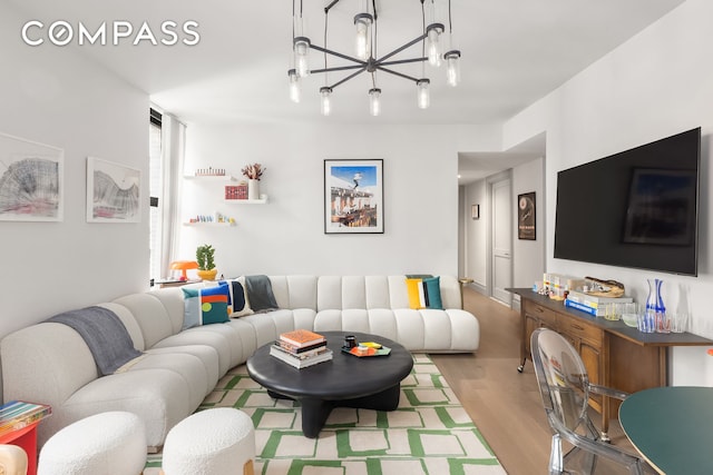 76 Schermerhorn St Unit 4C, New York City, NY 11201 - living area featuring a chandelier and wood finished floors