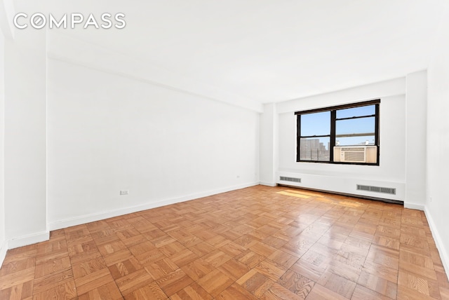 345 W 145th St Unit 8C3, New York City, NY 10031 - spare room with baseboards and cooling unit